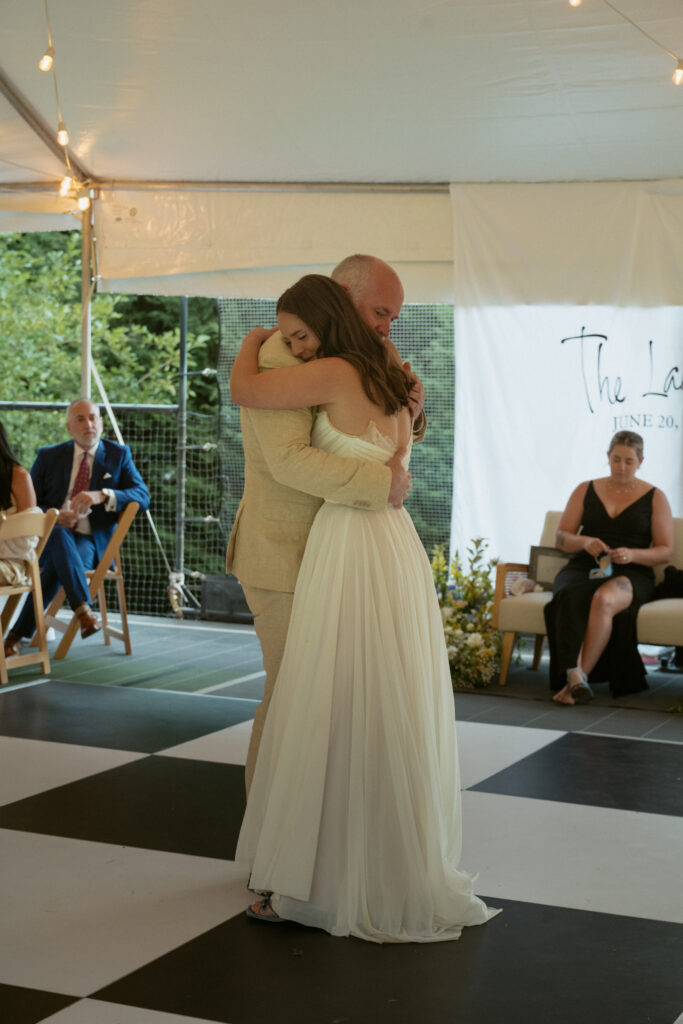 the father daughter dance with both of them crying