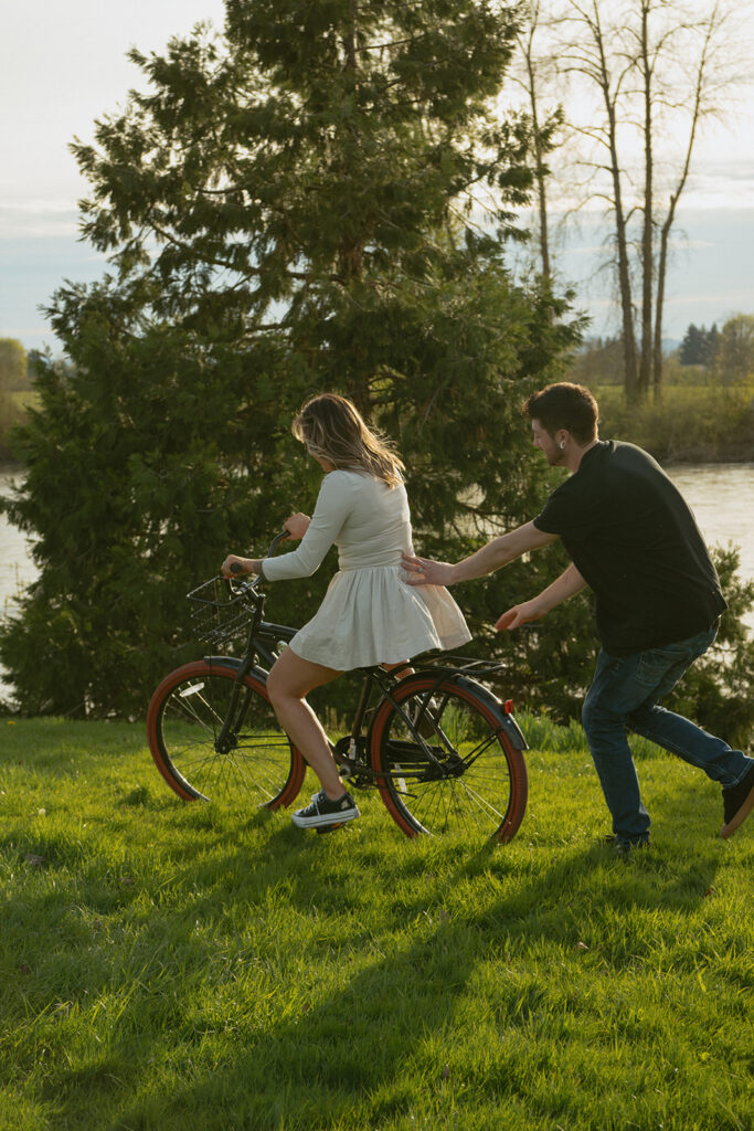 couple session riding bikes downtown