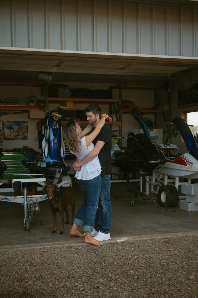 an engaged couple in the shop working on a project 