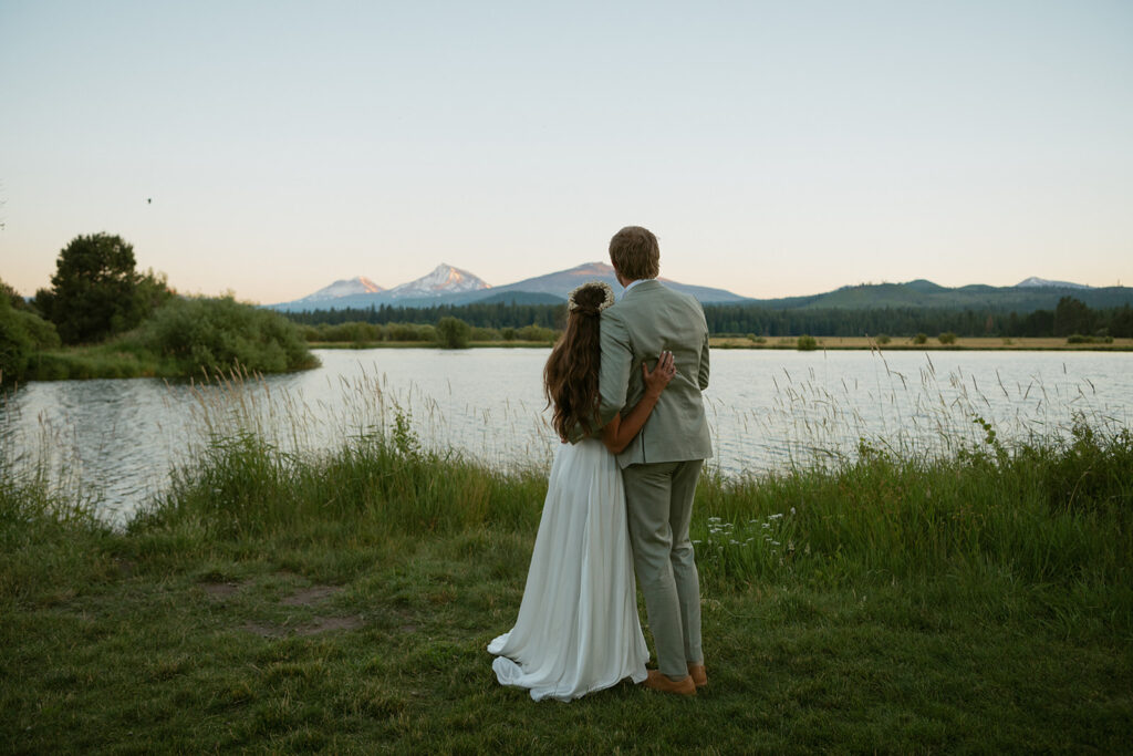 Sierra and Nate Sudfeld wedding at Black Butte Ranch in Sisters, Oregon — romantic outdoor ceremony with mountain views and golden sunset portraits