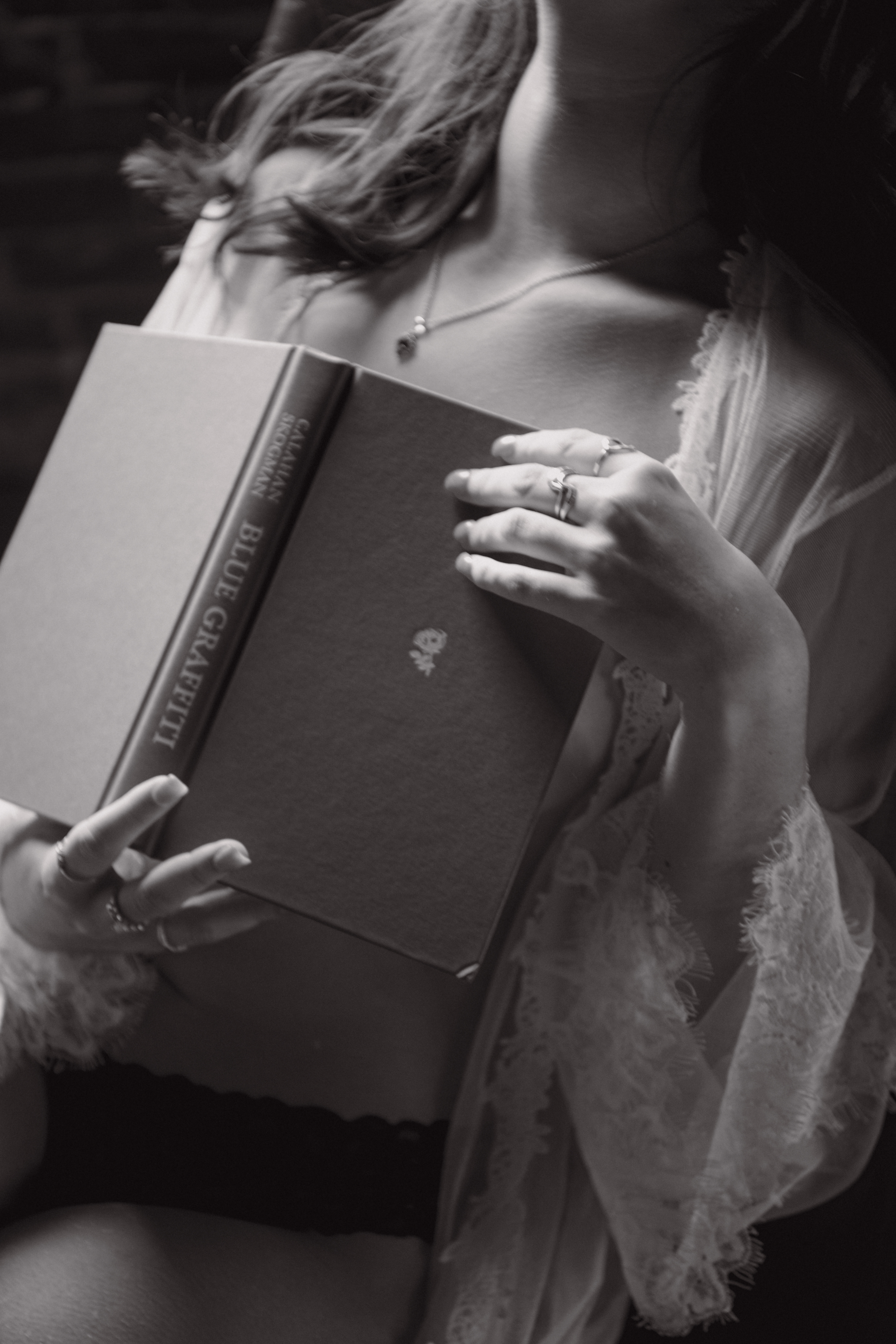 Warm, natural-light boudoir photo captured in my Eugene, Oregon studio - soft textures, calm energy, and authentic emotion