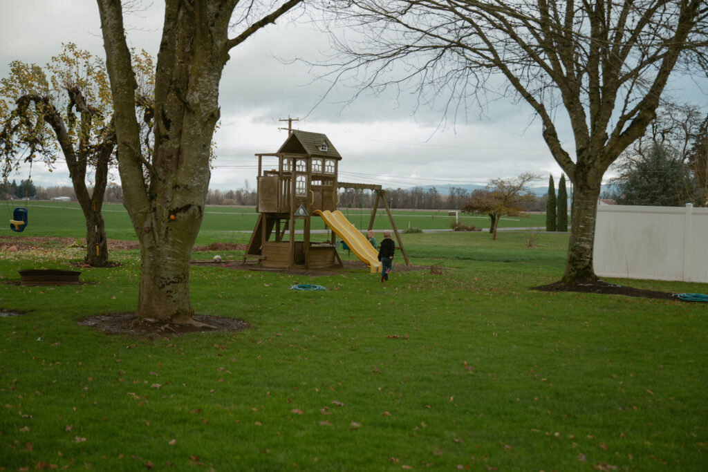 A in home family session with the kids running outside to play