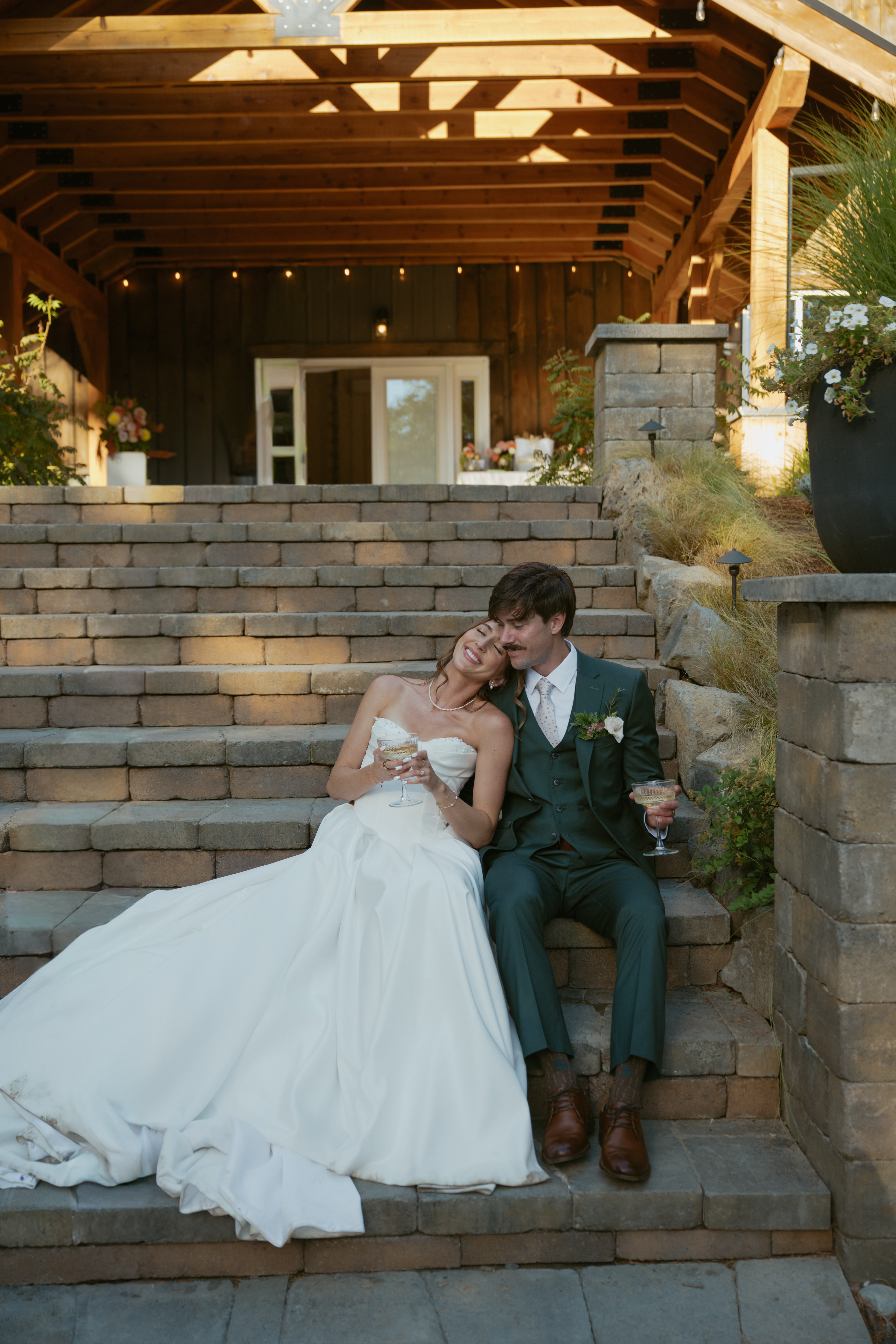 Couple sitting on the steps a rocky hill in white salmon Wa